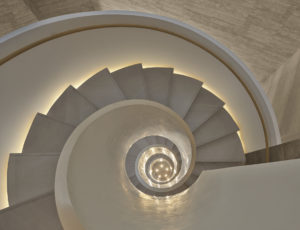 Looking down the center of a spiral staircase