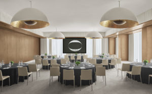 Naturally lit meeting room with round tables